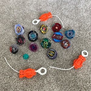 Big lot of Beyblades with launchers